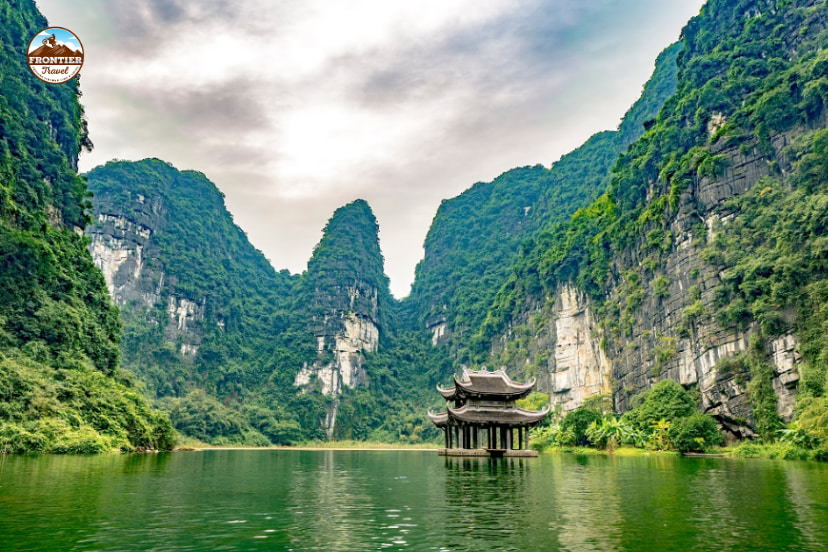 Trang An Landscape Complex with limestone mountains, rivers, and traditional boats